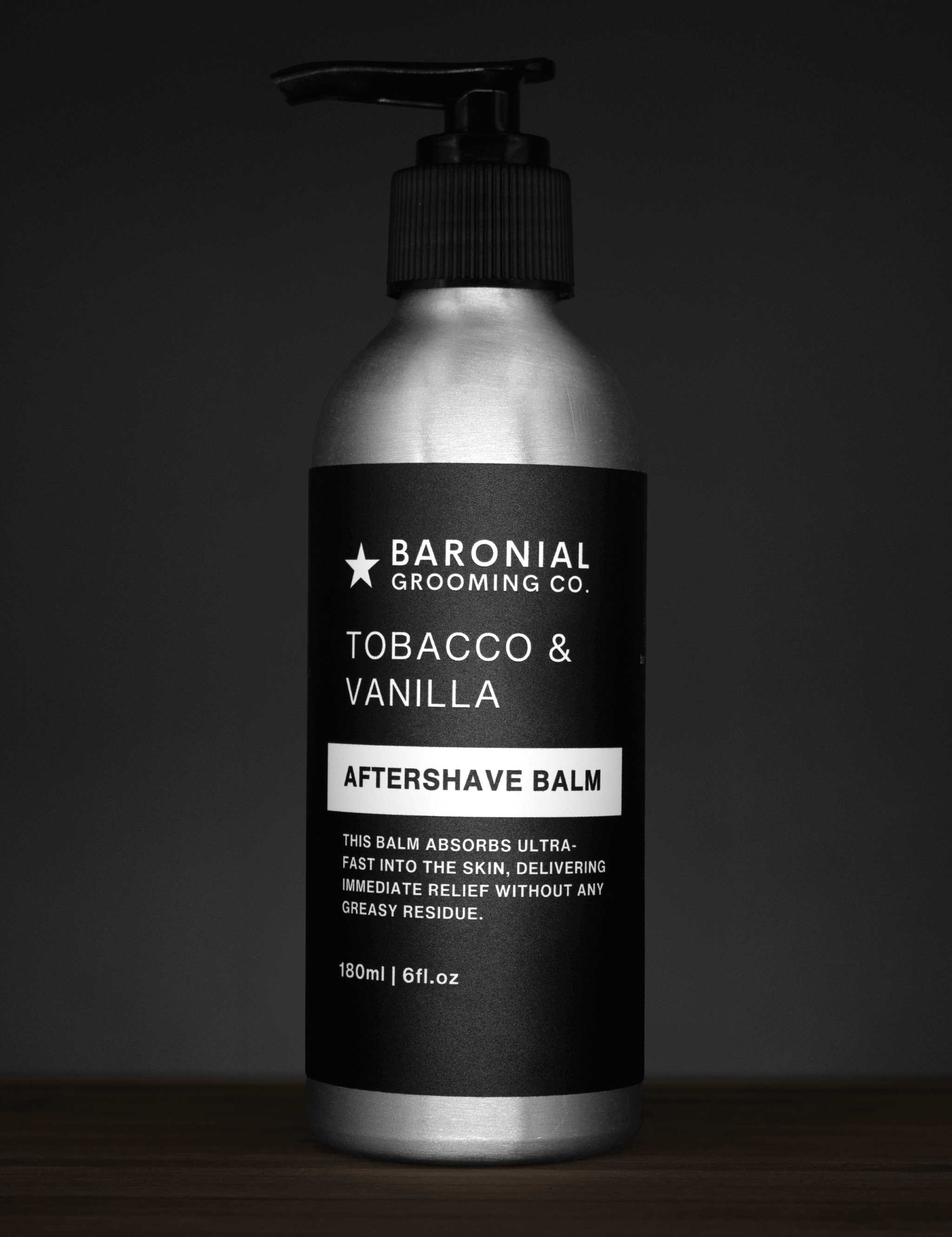 Tobacco & Vanilla Aftershave Balm on dark rustic background – nourishing post-shave balm with warm, masculine scent.